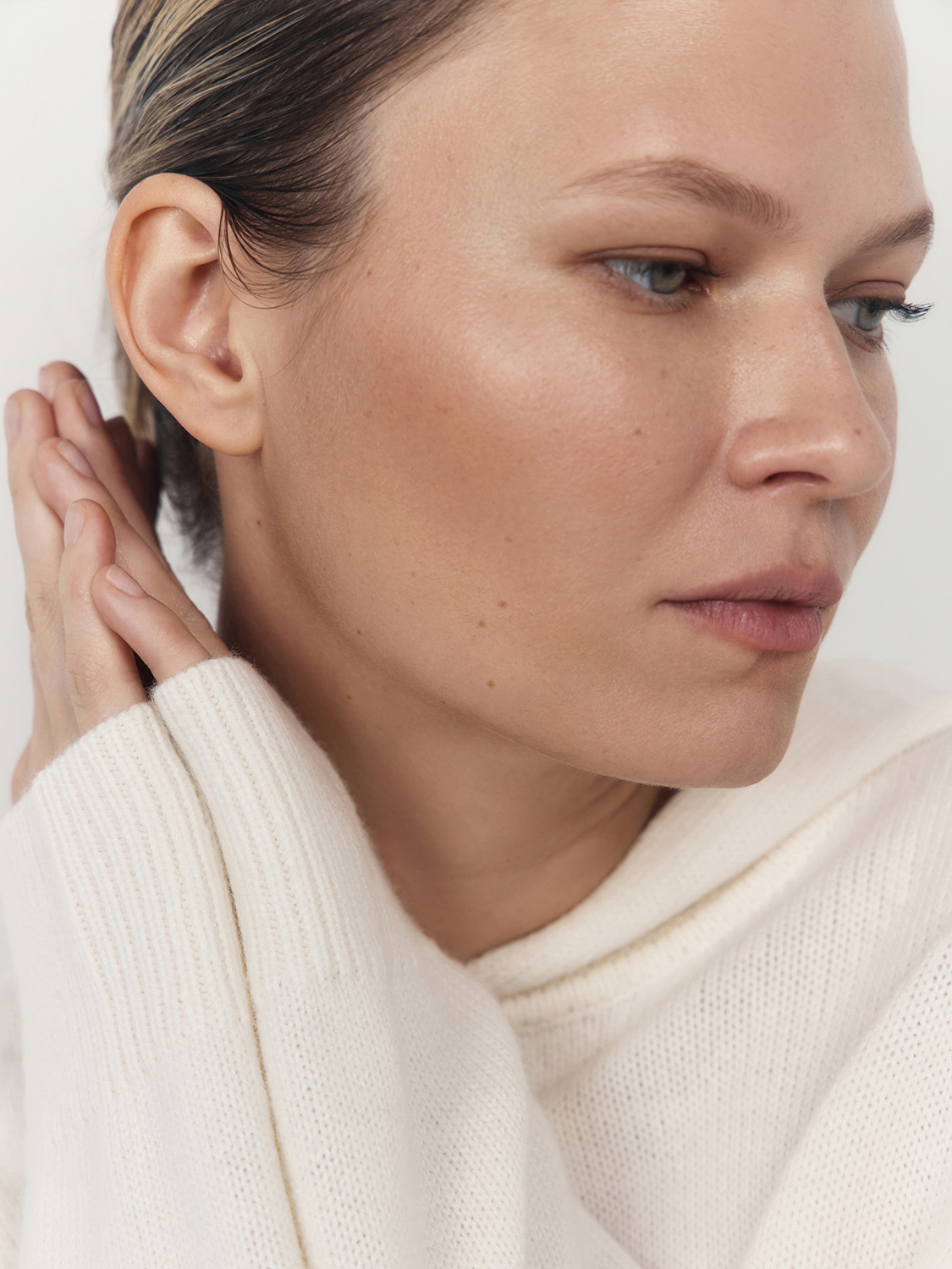 After retouch — close-up portrait with refined skin, clean and polished finish